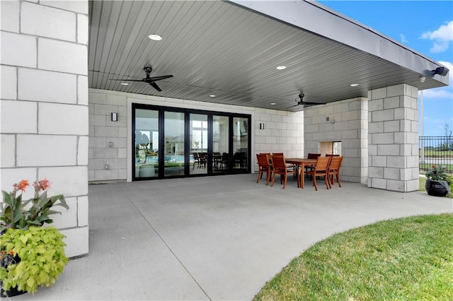 view of patio with ceiling fan