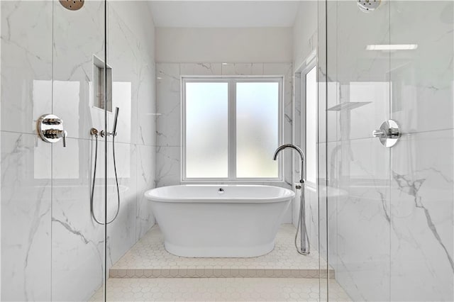 17321 Gillette St, Overland Park, KS 66221 - full bath featuring a marble finish shower, a soaking tub, and tile patterned floors