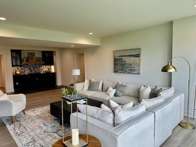17321 Gillette St, Overland Park, KS 66221 - living area with wood finished floors and recessed lighting