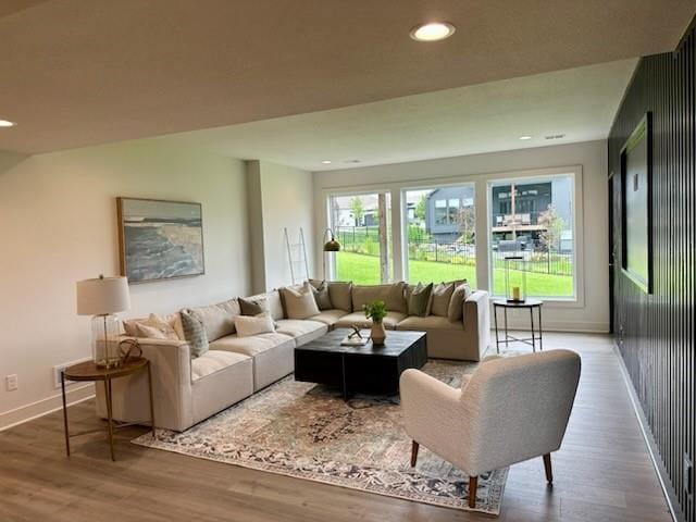 17321 Gillette St, Overland Park, KS 66221 - living area featuring wood finished floors and recessed lighting
