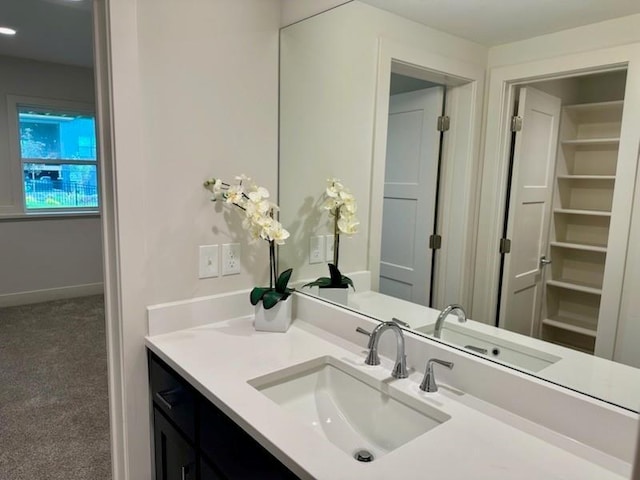 17321 Gillette St, Overland Park, KS 66221 - bathroom with vanity and baseboards
