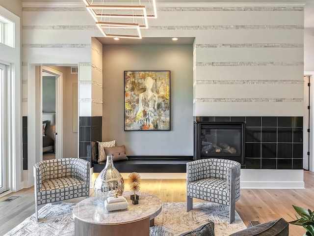 sitting room with light hardwood / wood-style floors