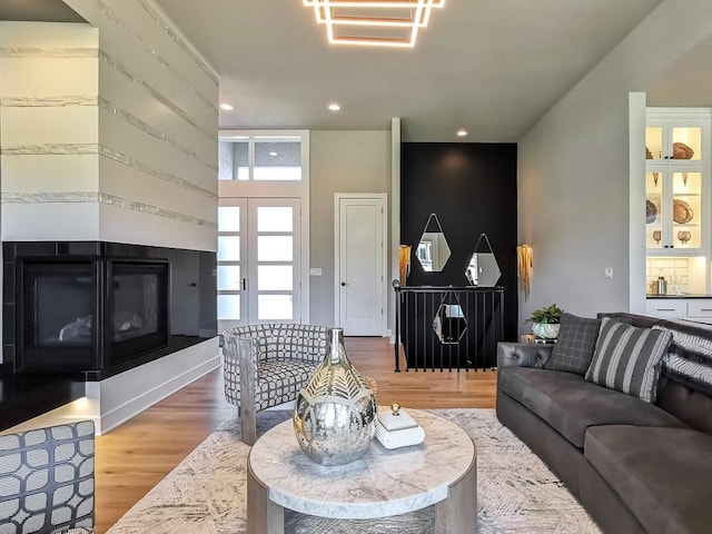 living room featuring french doors and wood-type flooring