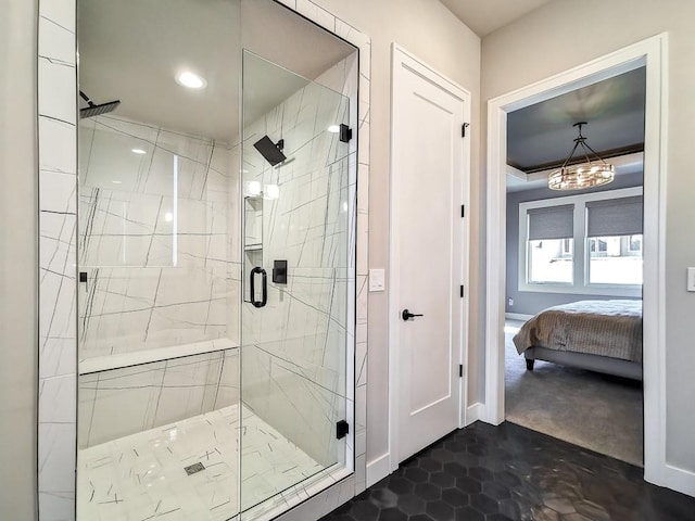 bathroom featuring a shower with door