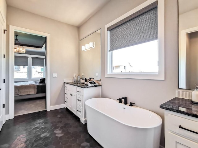 bathroom featuring vanity and a bathtub