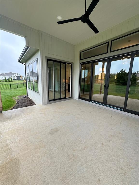 view of patio / terrace featuring ceiling fan