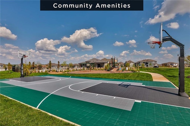 view of basketball court with a playground and a lawn