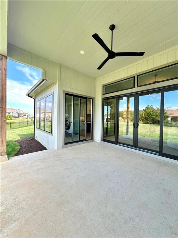 view of patio featuring ceiling fan