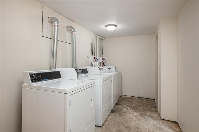 washroom featuring washer hookup and washer and dryer