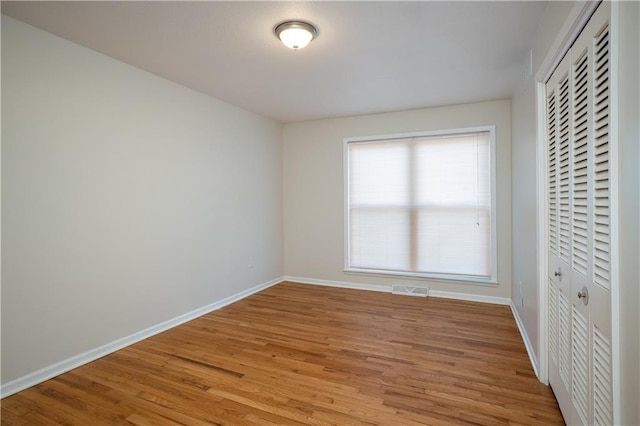 unfurnished bedroom with light hardwood / wood-style flooring