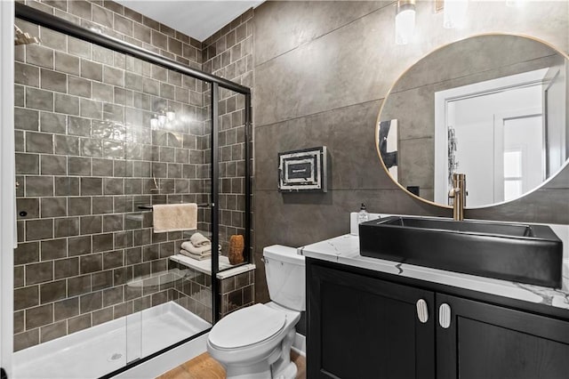 11522 S Zarda Dr, Olathe, KS 66061 - bathroom featuring a stall shower, toilet, and vanity