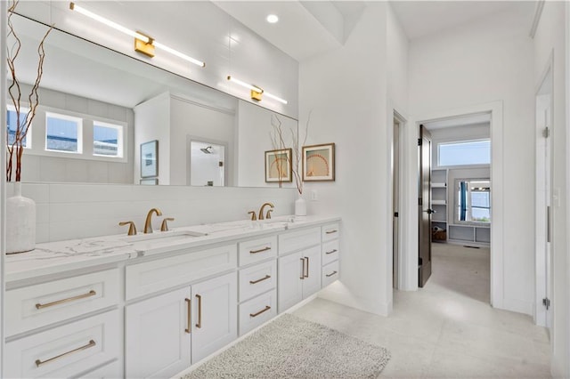 11522 S Zarda Dr, Olathe, KS 66061 - full bathroom with plenty of natural light, double vanity, and a sink