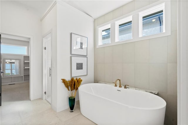11522 S Zarda Dr, Olathe, KS 66061 - bathroom with a soaking tub and baseboards