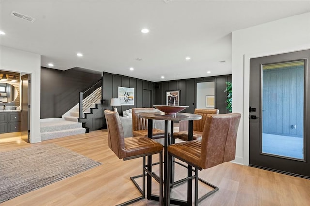 11522 S Zarda Dr, Olathe, KS 66061 - dining space with visible vents, stairway, light wood finished floors, and recessed lighting