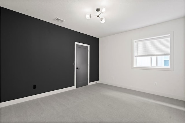 11522 S Zarda Dr, Olathe, KS 66061 - carpeted spare room with visible vents and baseboards