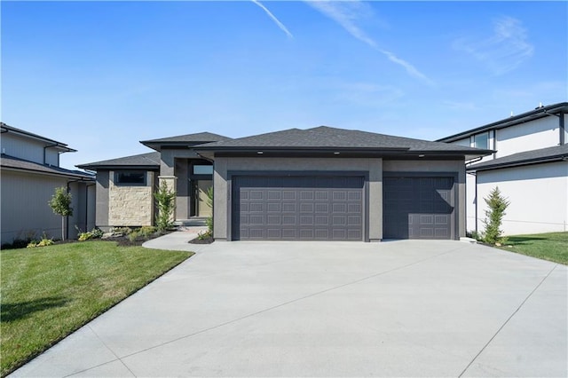 11522 S Zarda Dr, Olathe, KS 66061 - prairie-style home featuring driveway, a front yard, stucco siding, and a garage