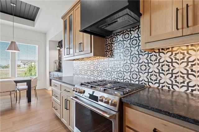 11522 S Zarda Dr, Olathe, KS 66061 - kitchen with decorative backsplash, under cabinet range hood, glass insert cabinets, light wood-style floors, and high end stainless steel range oven