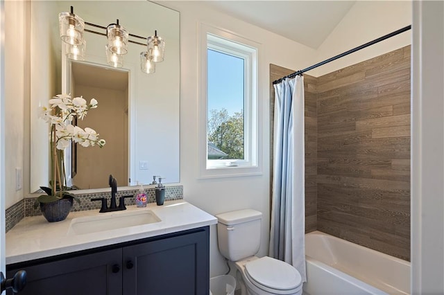 full bathroom featuring toilet, vanity, and shower / tub combo