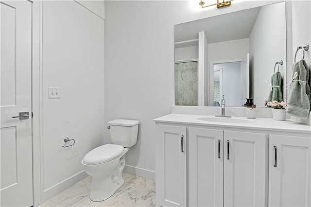 bathroom featuring vanity, toilet, and walk in shower