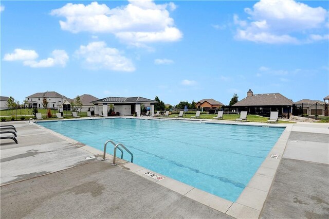 view of swimming pool featuring a patio