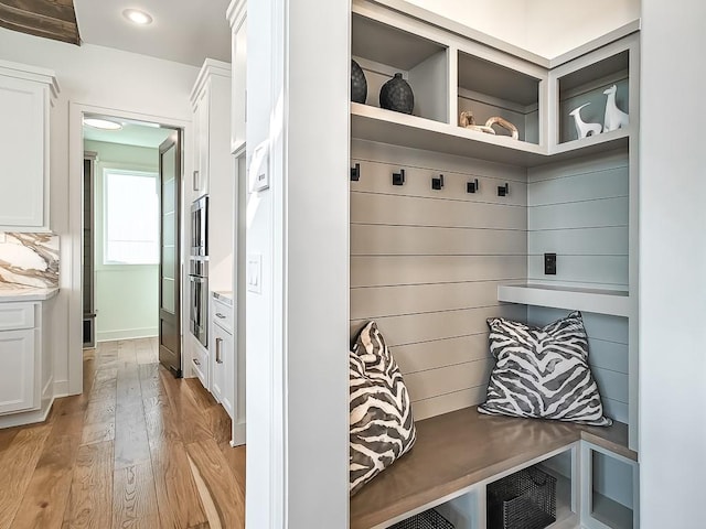 mudroom with light wood-type flooring