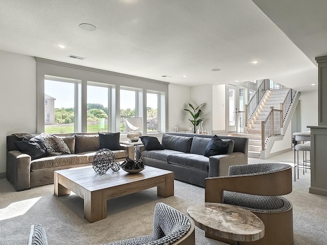 living room with light colored carpet