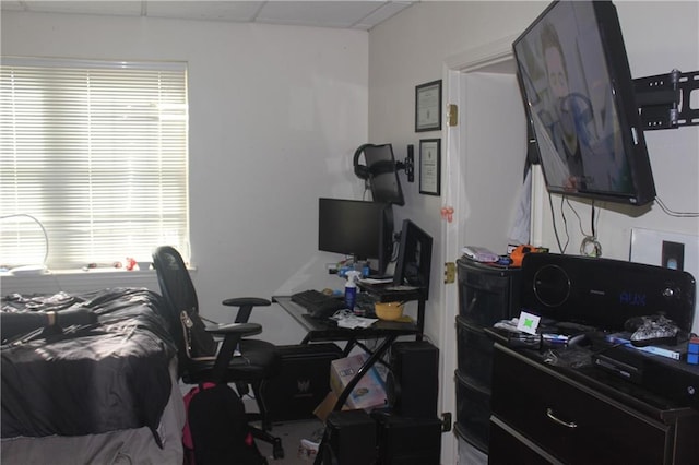 office featuring a paneled ceiling