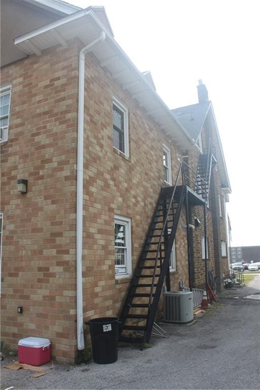 view of property exterior with central air condition unit