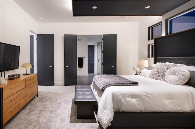 2150 Palisades Dr, Riverside, MO 64150 - bedroom featuring light carpet