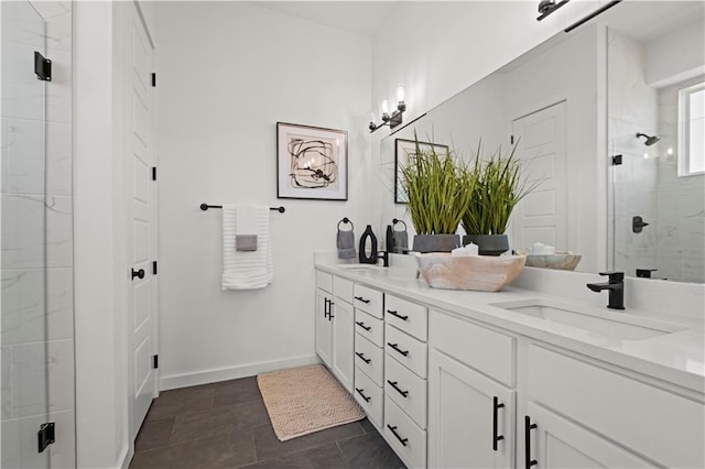 bathroom featuring vanity and an enclosed shower