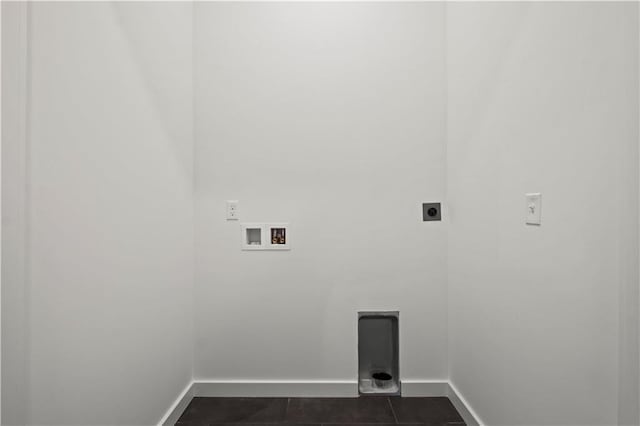 457 SW Longview Blvd, Lees Summit, MO 64081 - washroom with electric dryer hookup, baseboards, hookup for a washing machine, and dark tile patterned floors