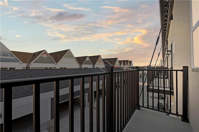 view of balcony at dusk