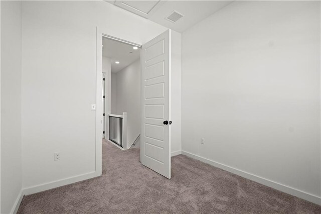 451 SW Longview Blvd, Lees Summit, MO 64081 - unfurnished room with carpet floors, baseboards, recessed lighting, and attic access