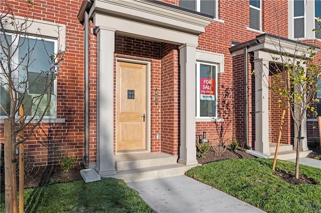 451 SW Longview Blvd, Lees Summit, MO 64081 - property entrance featuring brick siding