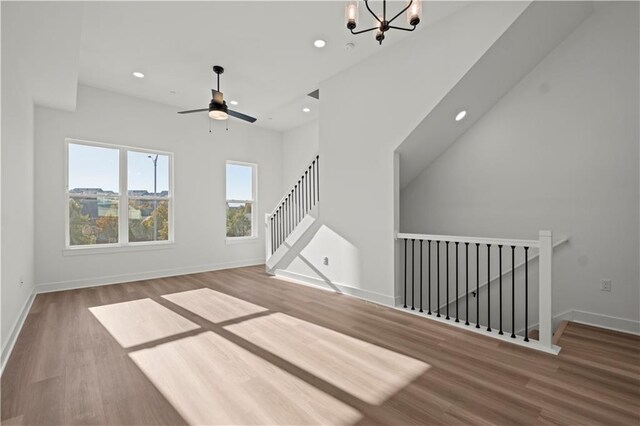 451 SW Longview Blvd, Lees Summit, MO 64081 - unfurnished living room featuring wood finished floors, ceiling fan, recessed lighting, and baseboards