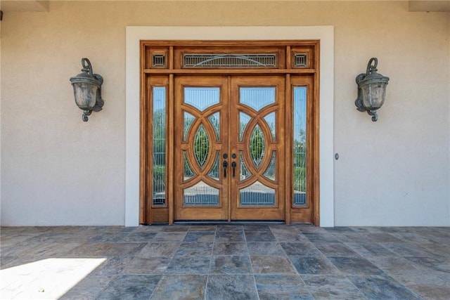1709 Lake Alvamar Dr, Lawrence, KS 66047 - doorway to property featuring stucco siding
