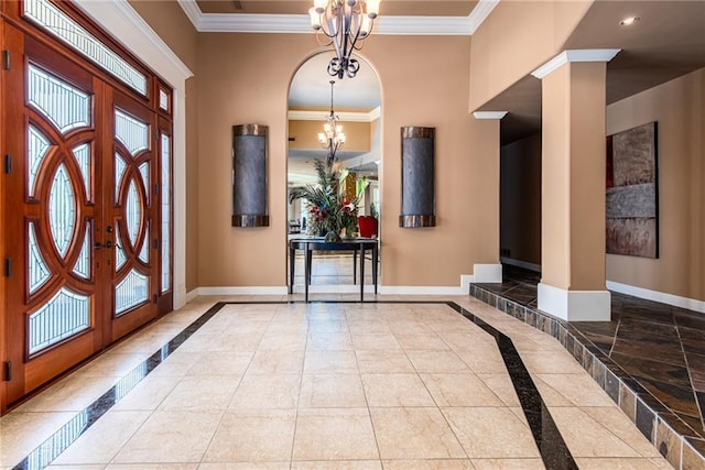 1709 Lake Alvamar Dr, Lawrence, KS 66047 - entryway featuring an inviting chandelier, ornamental molding, a wealth of natural light, and baseboards