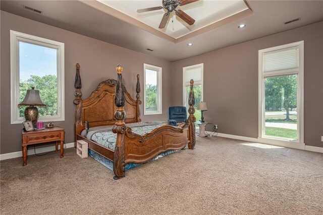 1709 Lake Alvamar Dr, Lawrence, KS 66047 - bedroom with multiple windows, visible vents, and carpet floors