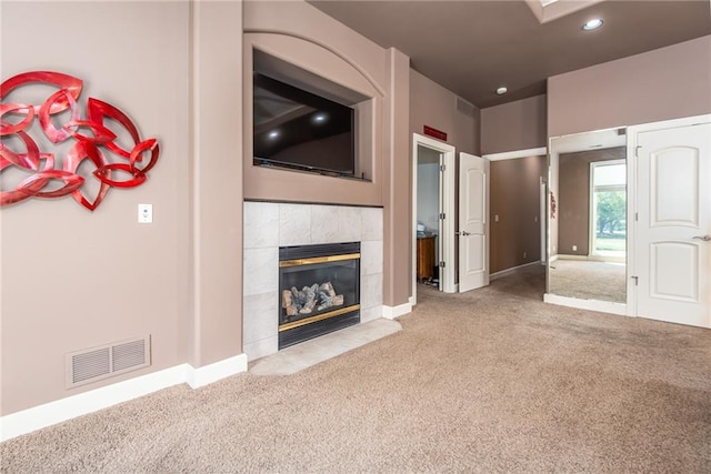1709 Lake Alvamar Dr, Lawrence, KS 66047 - unfurnished living room with a fireplace, carpet, baseboards, and visible vents