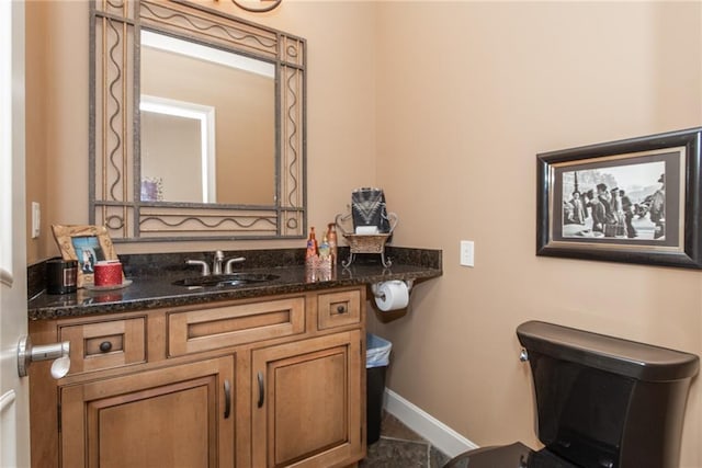 1709 Lake Alvamar Dr, Lawrence, KS 66047 - bathroom featuring baseboards and vanity