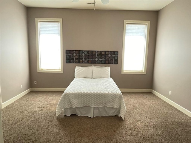 1709 Lake Alvamar Dr, Lawrence, KS 66047 - carpeted bedroom with baseboards