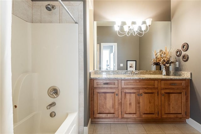 1709 Lake Alvamar Dr, Lawrence, KS 66047 - bathroom with bathtub / shower combination, a notable chandelier, tile patterned floors, baseboards, and vanity
