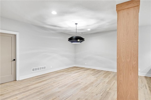 unfurnished dining area with light hardwood / wood-style floors