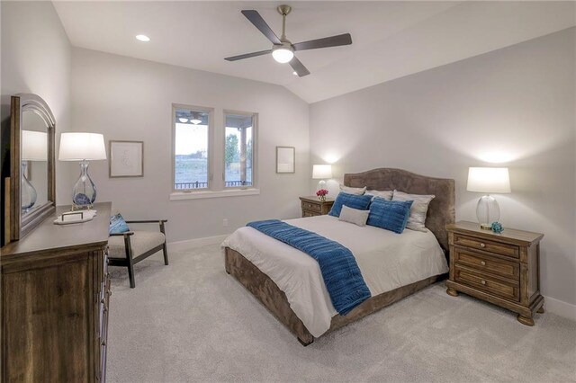 12200 W 138th Pl, Overland Park, KS 66221 - bedroom with light colored carpet, baseboards, ceiling fan, and vaulted ceiling
