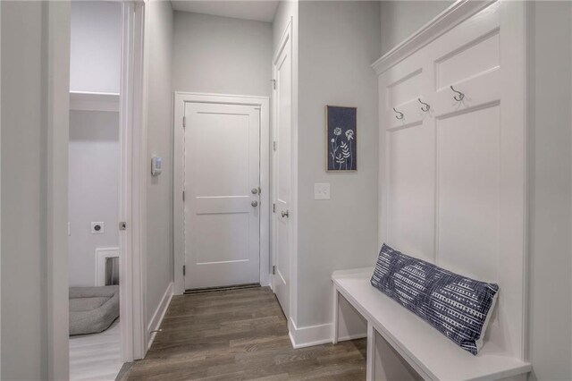 12200 W 138th Pl, Overland Park, KS 66221 - mudroom with dark wood-style flooring and baseboards