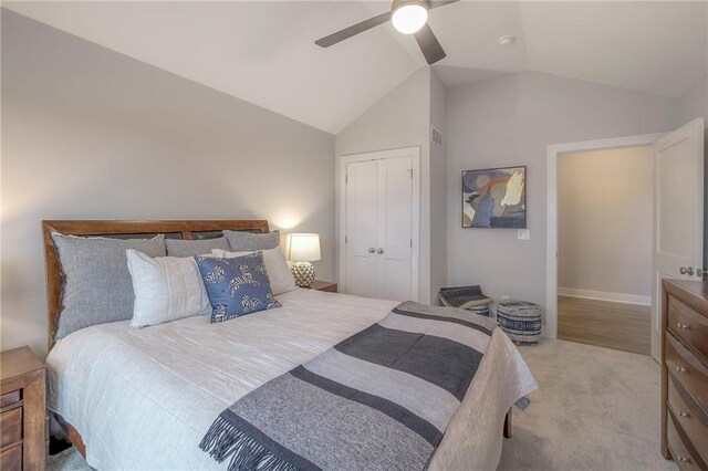 12200 W 138th Pl, Overland Park, KS 66221 - carpeted bedroom with vaulted ceiling, a closet, ceiling fan, and baseboards