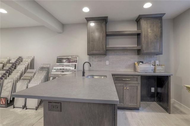 12200 W 138th Pl, Overland Park, KS 66221 - kitchen with a sink, a peninsula, open shelves, backsplash, and recessed lighting