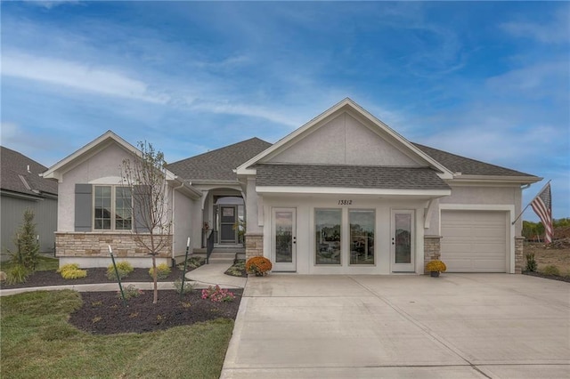 13812 Quigley St, Overland Park, KS 66221 - view of front of property with stone siding, stucco siding, concrete driveway, and a garage