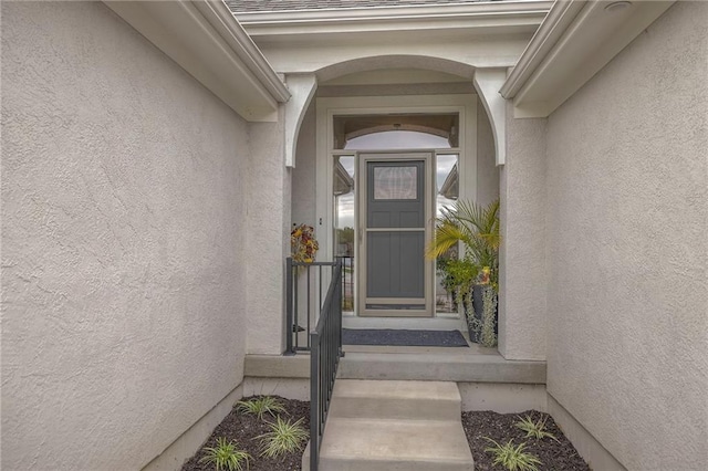 13812 Quigley St, Overland Park, KS 66221 - view of exterior entry with stucco siding