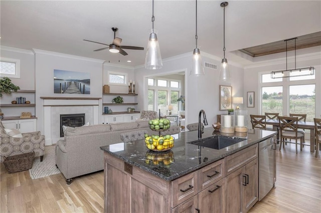 13812 Quigley St, Overland Park, KS 66221 - kitchen featuring a sink, crown molding, dishwasher, light wood-style flooring, and ceiling fan